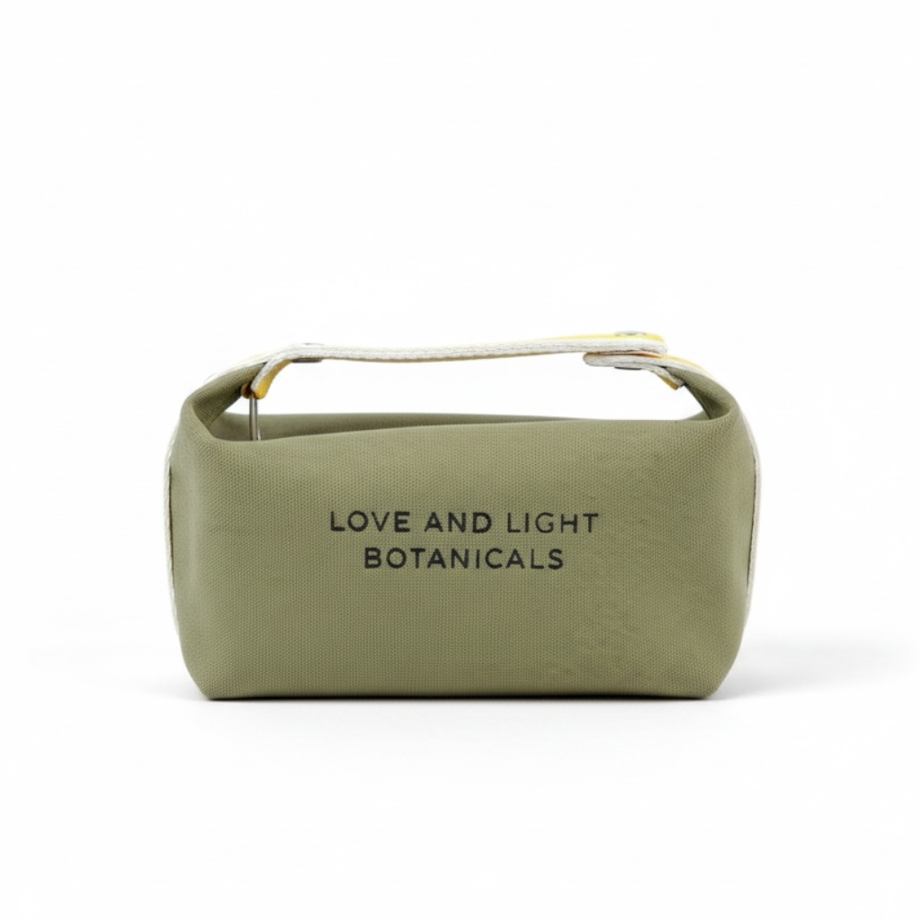 Sage hemp-jute cosmetic case with sunshine yellow carry handle, front view