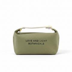 Sage hemp-jute cosmetic case with sunshine yellow carry handle, front view